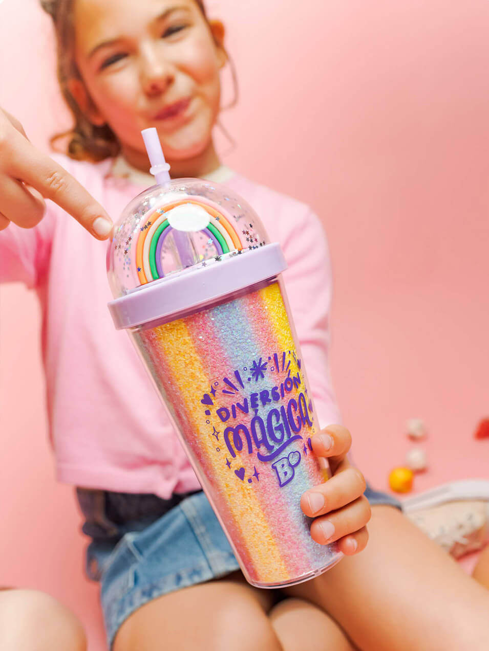 Image of girl with colorful sweet-flavored Belros drink